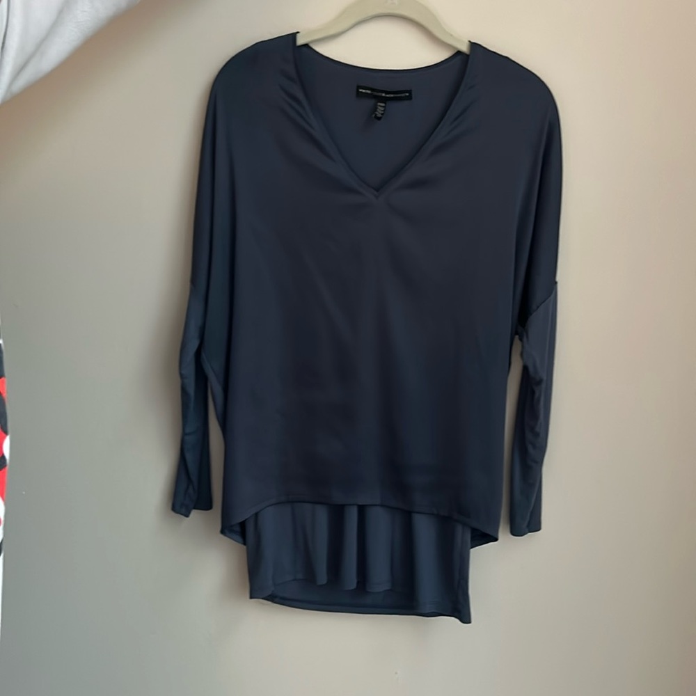 A elegant blouse navy blue from White House Black Market. Never Worn!!